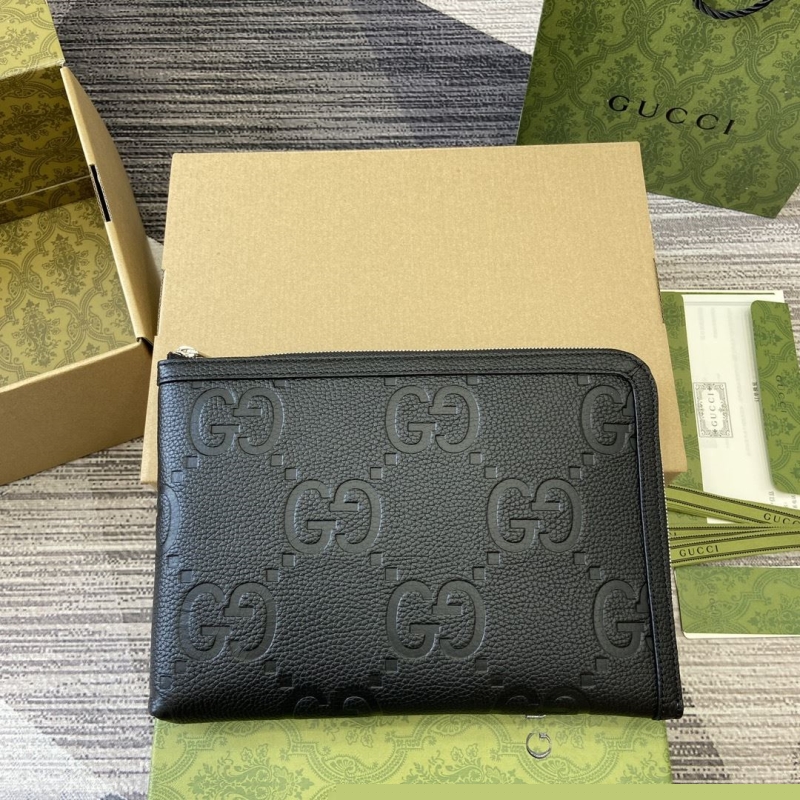 G*u*i clutch bags